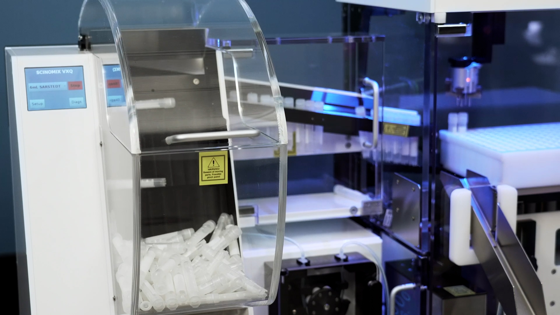 Scinomix VXQ bulk tube feeder conveniently loads tubes for automated processing